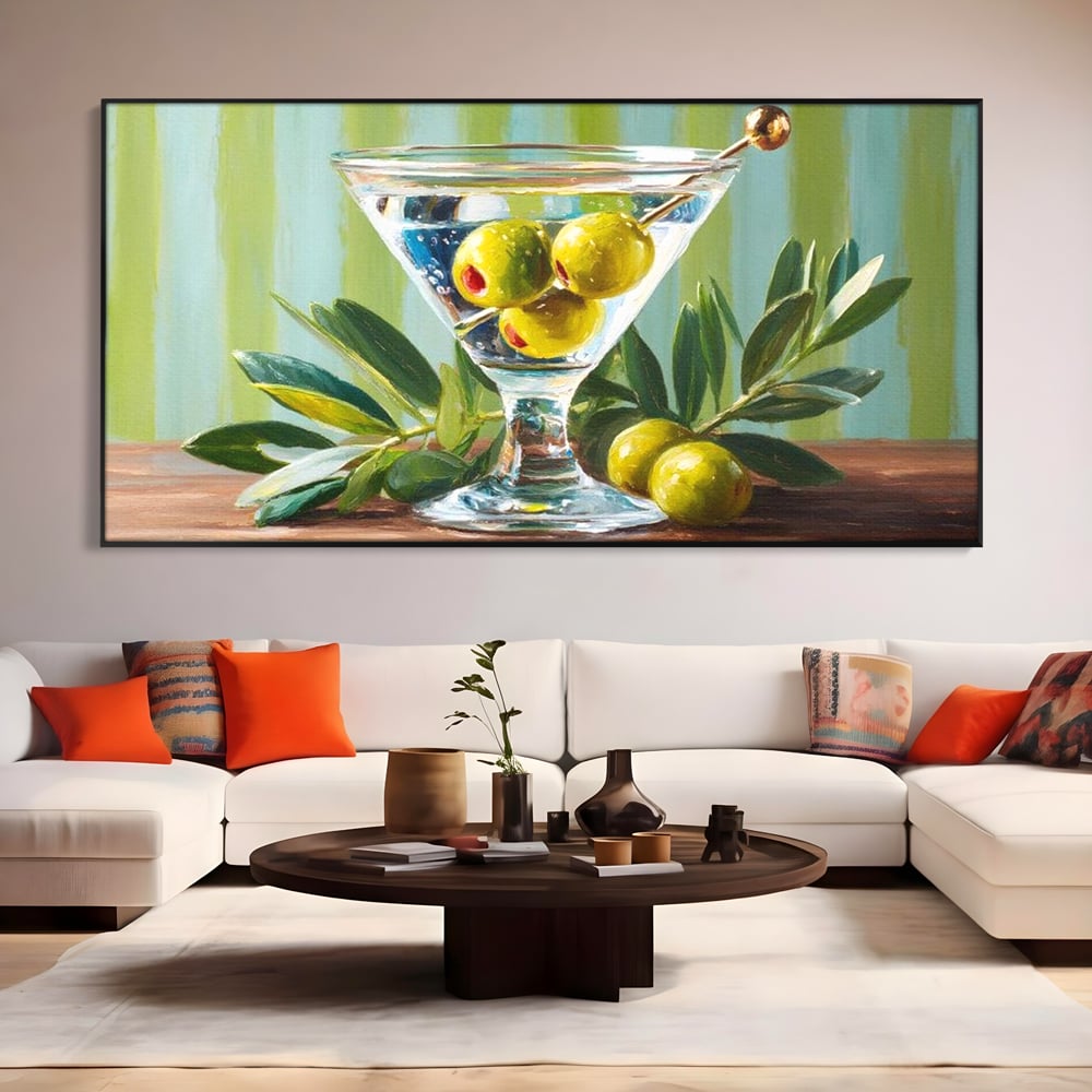 Tablou canvas cu pictura cu pahar martini si masline, in rama de aluminiu negru, pe perete intr-un living